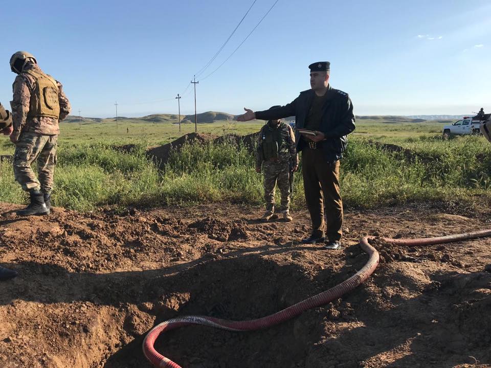 Police forces in Kirkuk confiscate two trucks in the site of an oil robbing, April 18, 2019. (Photo: Energy Police in Kirkuk)